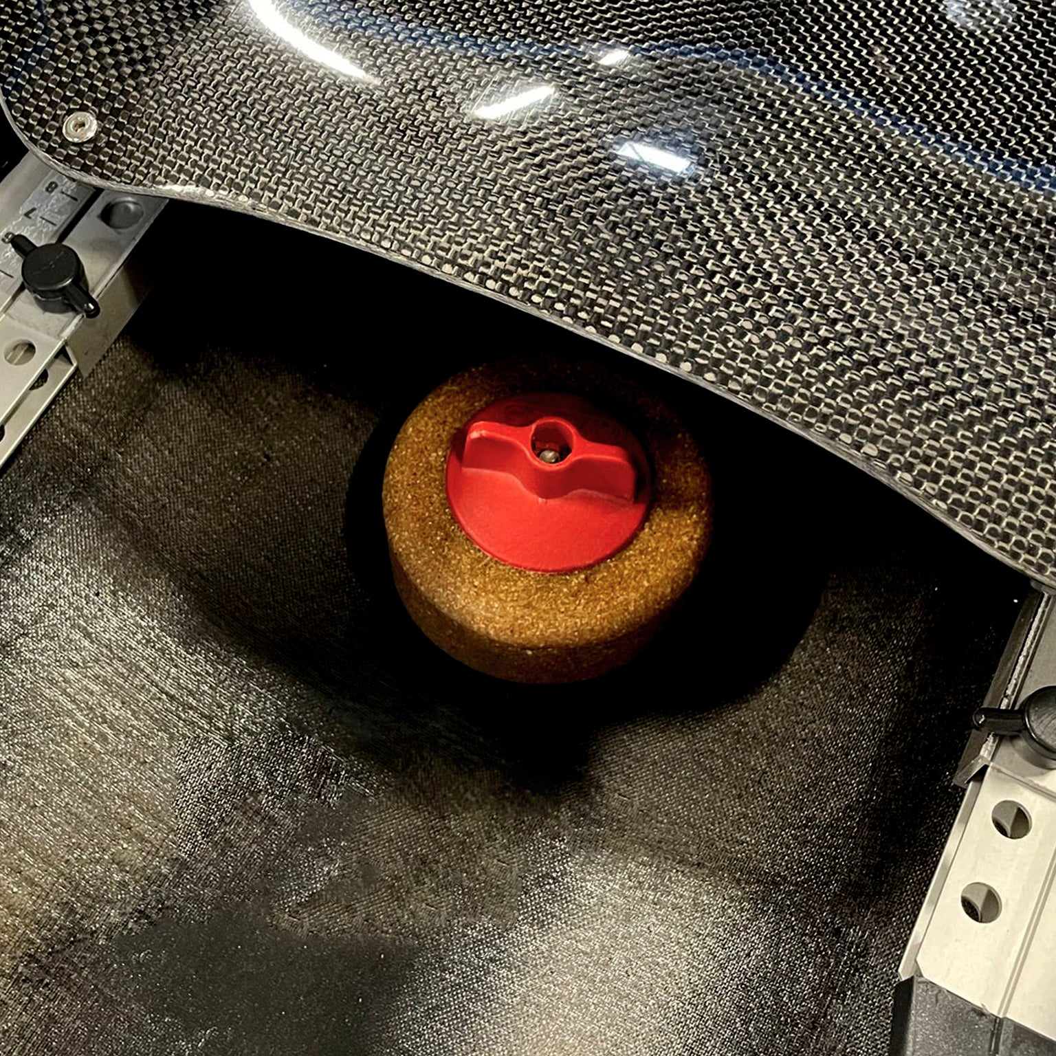 Nelo weight in epoxy for weight trimming of racing kayaks and canoes.