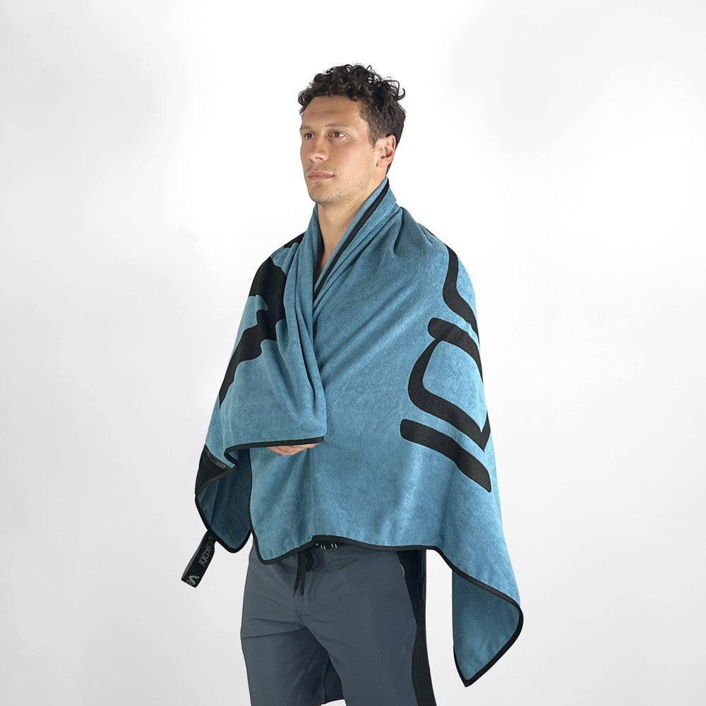 Vaikobi Beach Towel with Zip Pocket Ocean Blue - draped over shoulders back view