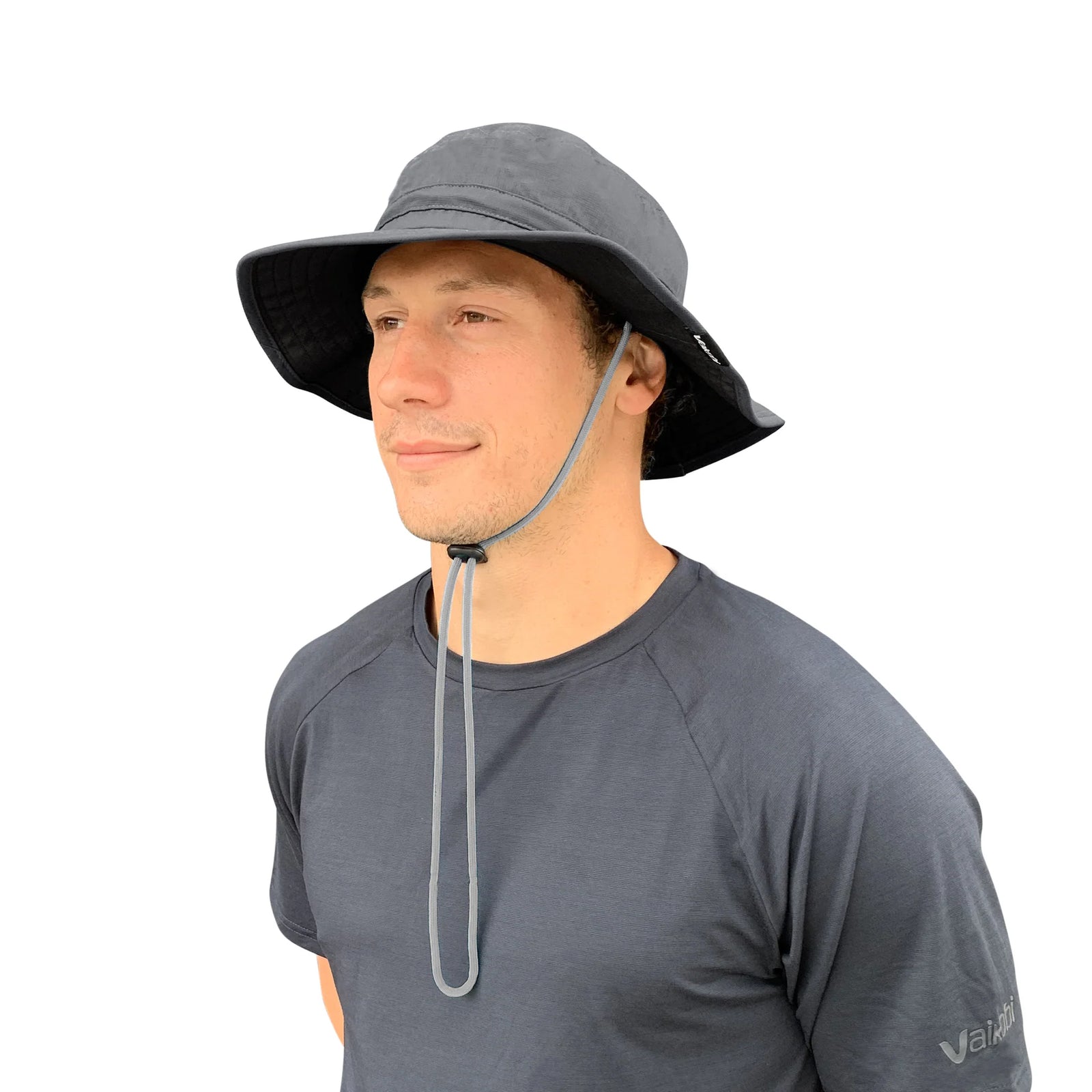 Man wearing Vaikobi UV Ocean Surf Hat in Charcoal color