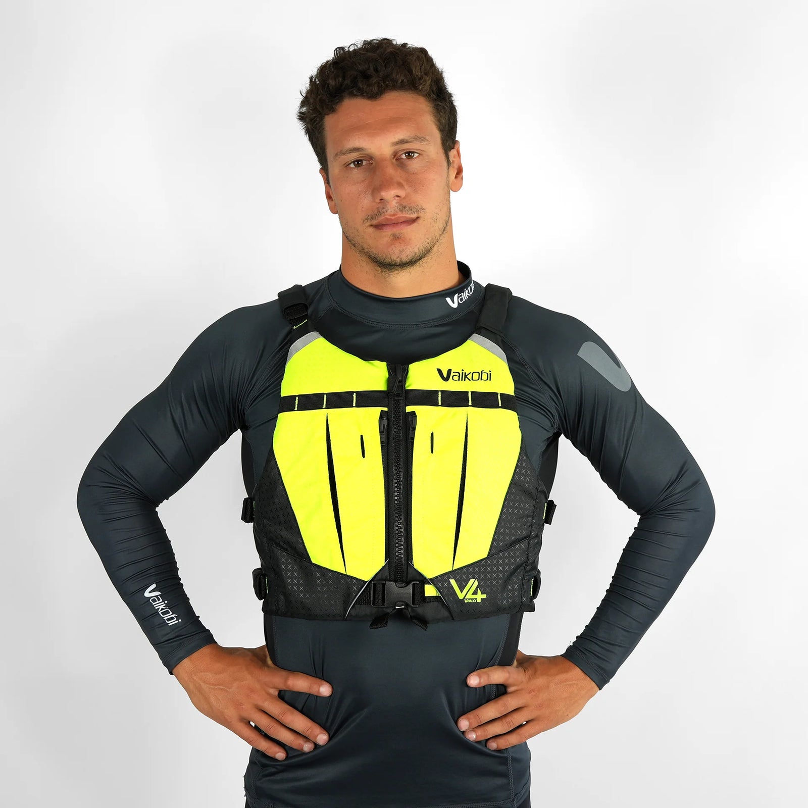 Front view of Vaikobi V4 Ocean Racing PFD Life Vest in bright orange, designed for enhanced visibility and safety during paddling.