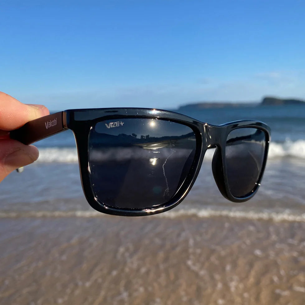 Vaikobi Viento Polarized Sunglasses - in front of water at beach