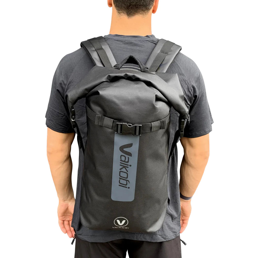 Vaikobi 30 liter dry backpack, with model from behind, alternative picture